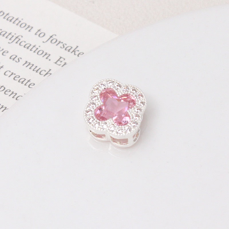 Multi-Pored Diamond-Encrusted Alloy Beads
